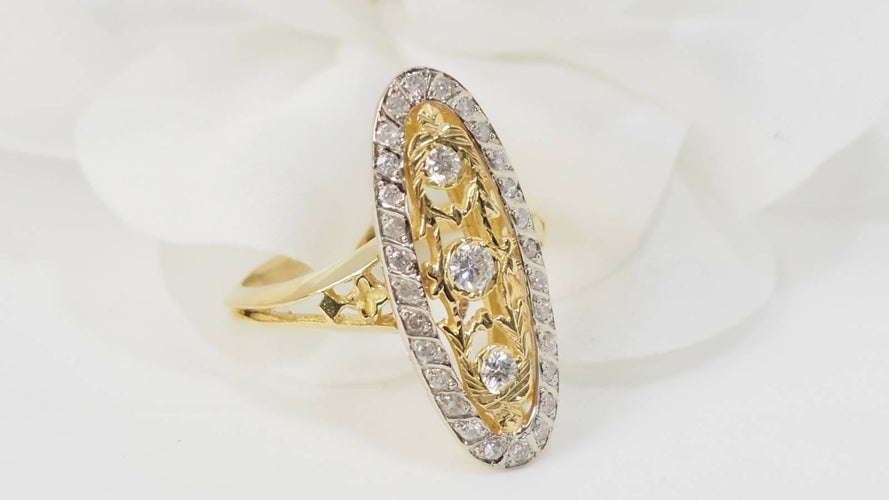 Bague 59.5 Bague marquise en or bicolore 18 kt et diamants 58 Facettes 33010