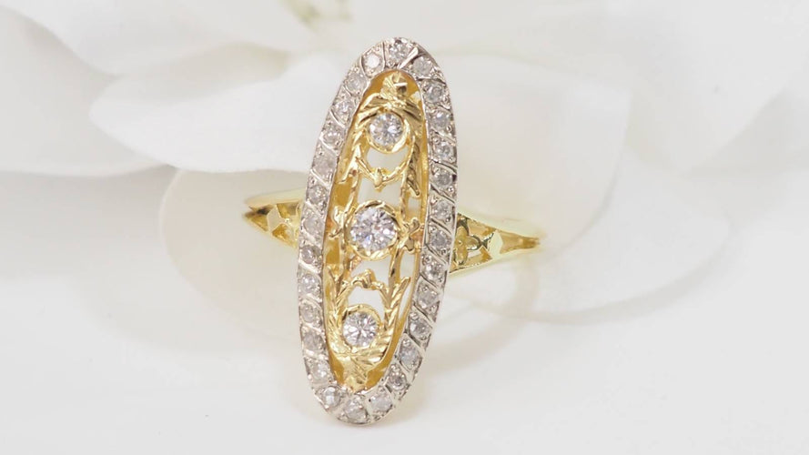 Bague 59.5 Bague marquise en or bicolore 18 kt et diamants 58 Facettes 33010