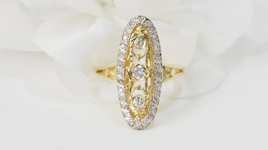 Bague 59.5 Bague marquise en or bicolore 18 kt et diamants 58 Facettes 33010
