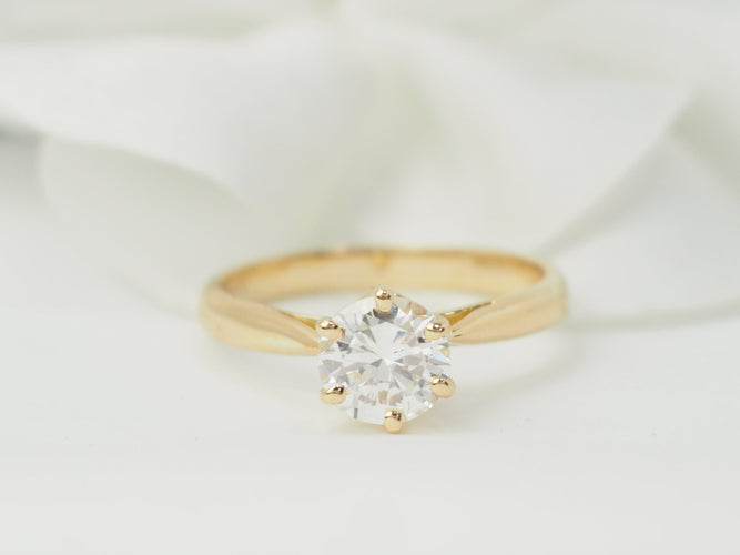 Bague 52.5 Bague solitaire en or jaune et diamant 0,97 ct 58 Facettes 33118