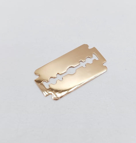Pendentif Pendentif vintage lame de rasoir en or rose 18k 58 Facettes A07148