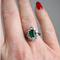 Bague 52.5 Bague marguerite française en or blanc, émeraude et diamants 58 Facettes RI-1020