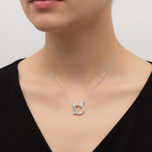 Pendentif Rétro - Pendentif écureuil en platine, or blanc, diamants et rubis 58 Facettes A2009E