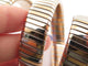 Montre Bulgari Tubogas - Montre triple tour en or jaune 18K et acier 58 Facettes 275115