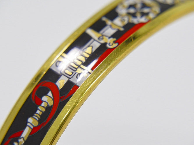 Bracelet Hermès - Bracelet en métal plaqué or et émail 58 Facettes g0dpkzh892