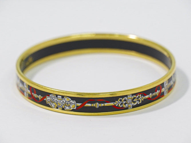Bracelet Hermès - Bracelet en métal plaqué or et émail 58 Facettes g0dpkzh892