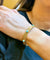 Bracelet Bracelet vintage en or jaune 18 carats et turquoises cabochons 58 Facettes Cab