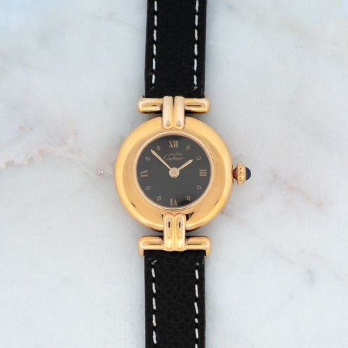 Montre Cartier Must Colisée - Montre en vermeil cadran romain noir 58 Facettes 532