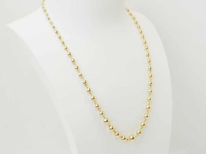 Collier Collier marseillais en or jaune 18 carats à boules dégradées 58 Facettes 33780