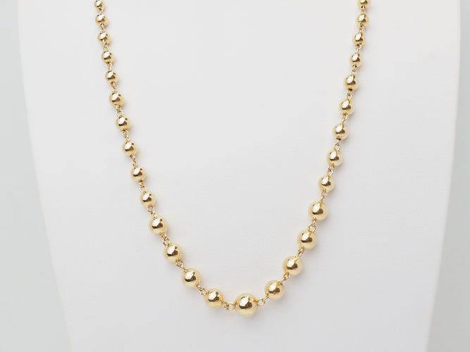 Collier Collier marseillais en or jaune 18 carats à boules dégradées 58 Facettes 33780