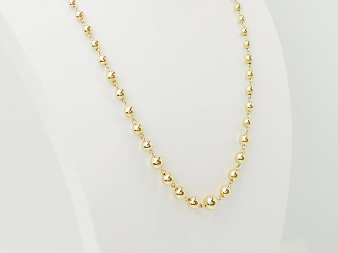 Collier Collier marseillais en or jaune 18 carats à boules dégradées 58 Facettes 33780
