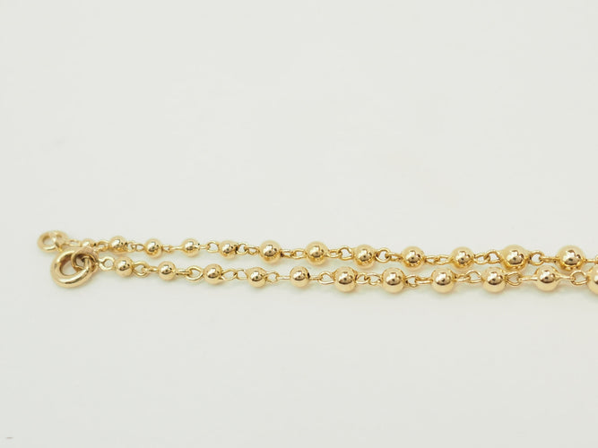 Collier Collier marseillais en or jaune 18 carats à boules dégradées 58 Facettes 33780