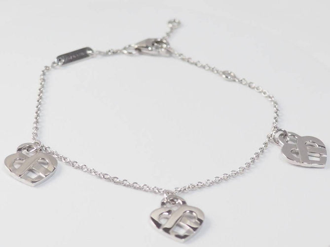 Bracelet Poiray Cœur Entrelacé - Bracelet en or blanc 58 Facettes 32973