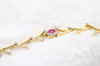 Parure florale en or jaune, rubis et diamants 58 Facettes 240164