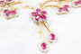 Parure florale en or jaune, rubis et diamants 58 Facettes 240164