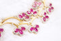 Parure florale en or jaune, rubis et diamants 58 Facettes 240164