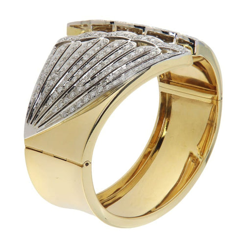 Bracelet Bracelet rigide en or jaune et blanc et diamants 58 Facettes G3963