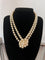 Collier Collier sautoir en or jaune 18K et perles de culture 58 Facettes 921