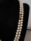 Collier Collier sautoir en or jaune 18K et perles de culture 58 Facettes 921