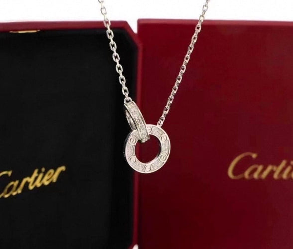Pendentif Cartier Love - Pendentif en or gris et diamants 58 Facettes jnci68