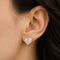 Boucles d'oreilles Boucles d'oreilles cœurs en or blanc et jaune 18k et diamants 58 Facettes FB11638