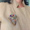 Broche Broche bouquet en or jaune 18 ct, cristal de roche rutilé et pierres 58 Facettes 261