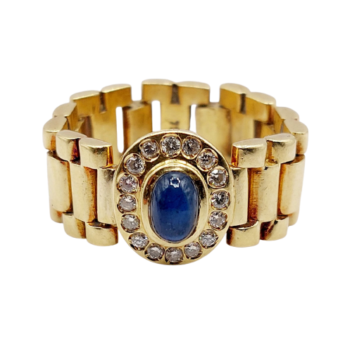 Bague souple en or 18k avec saphir cabochon et diamants