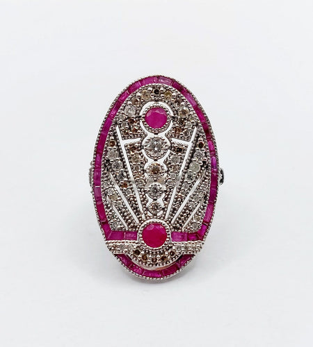 Bague 48 Bague marquise Art déco en or blanc 18k, rubis et diamants 58 Facettes A07360