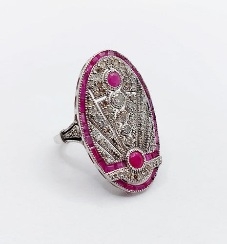 Bague 48 Bague marquise Art déco en or blanc 18k, rubis et diamants 58 Facettes A07360
