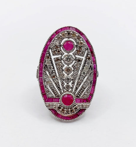 Bague 48 Bague marquise Art déco en or blanc 18k, rubis et diamants 58 Facettes A07360