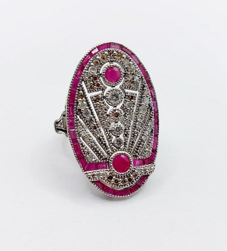 Bague 48 Bague marquise Art déco en or blanc 18k, rubis et diamants 58 Facettes A07360
