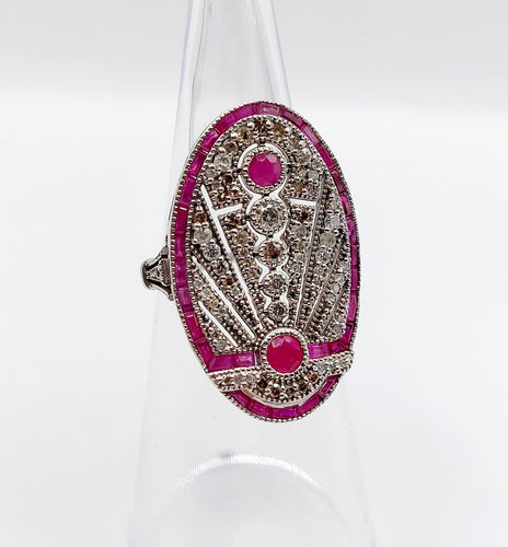 Bague 48 Bague marquise Art déco en or blanc 18k, rubis et diamants 58 Facettes A07360