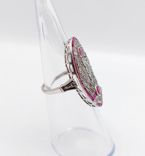 Bague 48 Bague marquise Art déco en or blanc 18k, rubis et diamants 58 Facettes A07360