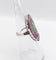 Bague 48 Bague marquise Art déco en or blanc 18k, rubis et diamants 58 Facettes A07360