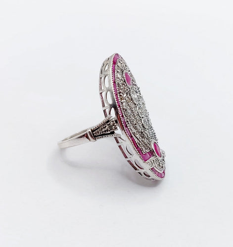 Bague 48 Bague marquise Art déco en or blanc 18k, rubis et diamants 58 Facettes A07360