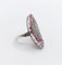 Bague 48 Bague marquise Art déco en or blanc 18k, rubis et diamants 58 Facettes A07360