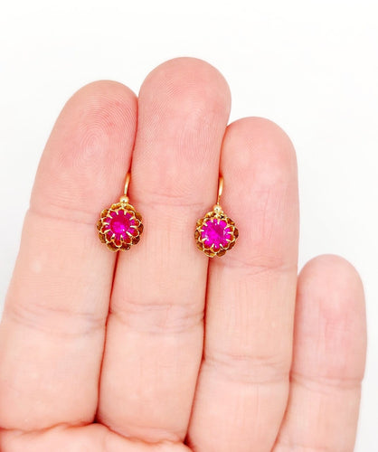Boucles d'oreilles Dormeuses antiques circa 1900 en or rose 18k et rubis synthétiques 58 Facettes A07372