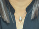 Collier Collier pendentif en or blanc et diamants 58 Facettes 29193
