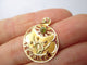 Pendentif Art Nouveau - Pendentif Février en or rose et péridot 58 Facettes Pendentif