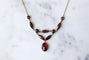 Collier Collier draperie ancien en or rose et or jaune, grenats de Perpignan 58 Facettes