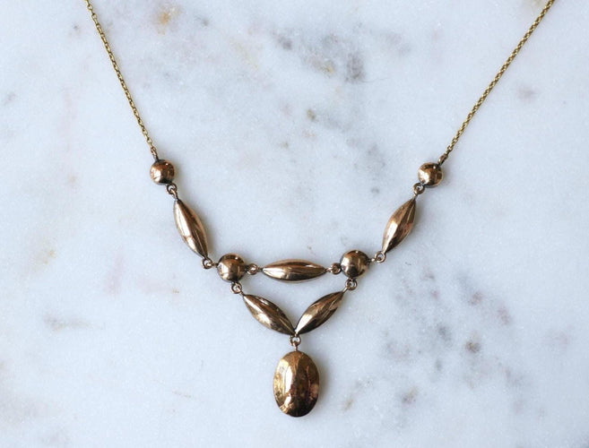 Collier Collier draperie ancien en or rose et or jaune, grenats de Perpignan 58 Facettes
