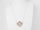 Collier Collier volutes en or jaune, argent, grenats, diamants et perle 58 Facettes 33049