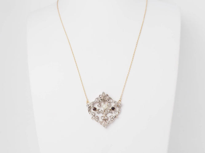 Collier Collier volutes en or jaune, argent, grenats, diamants et perle 58 Facettes 33049