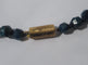 Collier Collier en chute en pierres bleues naturelles et fermoir or rose émaillé 58 Facettes Collier