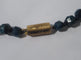 Collier Collier en chute en pierres bleues naturelles et fermoir or rose émaillé 58 Facettes Collier