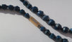 Collier Collier en chute en pierres bleues naturelles et fermoir or rose émaillé 58 Facettes Collier