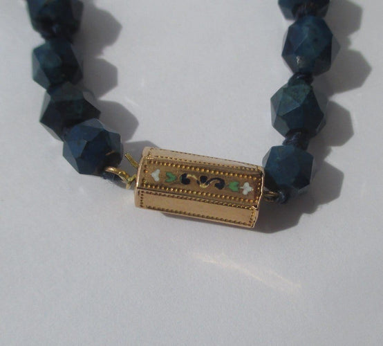 Collier Collier en chute en pierres bleues naturelles et fermoir or rose émaillé 58 Facettes Collier