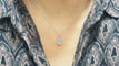 Collier Collier solitaire en or blanc et topaze bleue 58 Facettes CLAL