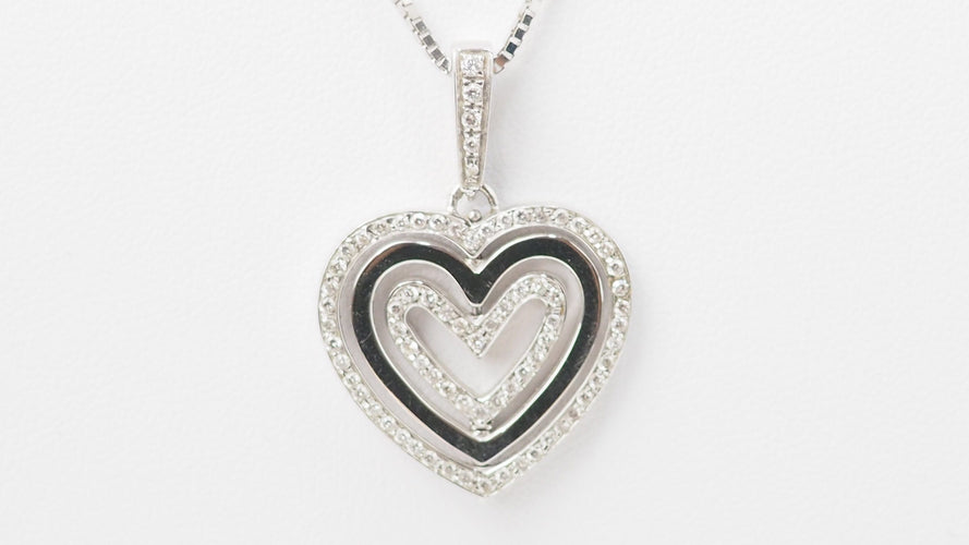 Collier Collier pendentif multi-cœurs en or blanc et diamants 58 Facettes 21089
