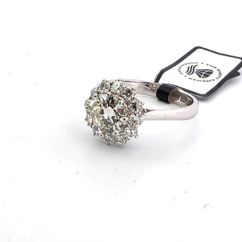 Bague 53 Bague en or blanc 18 ct avec diamant central et diamants 58 Facettes 12 B OC